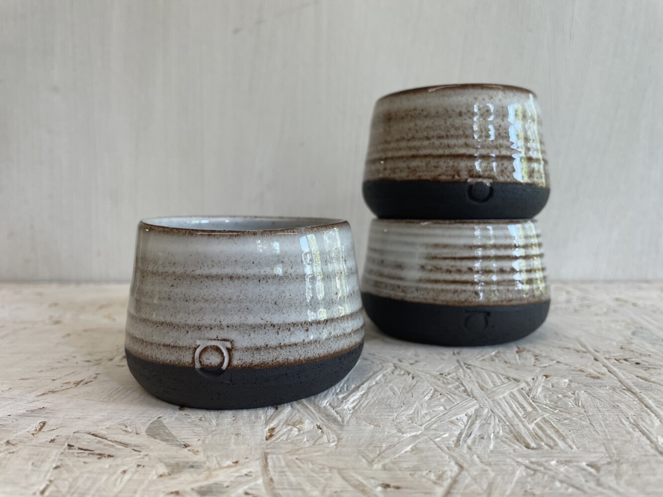 IMG_7132 cup rounded - white on black clay